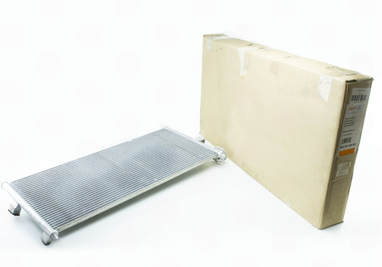 радиатор кондиционера Nissan Almera N16 1.5/1.8 (00->) мкпп   (HELLA) 8FC 351 038-581 - зображення 1