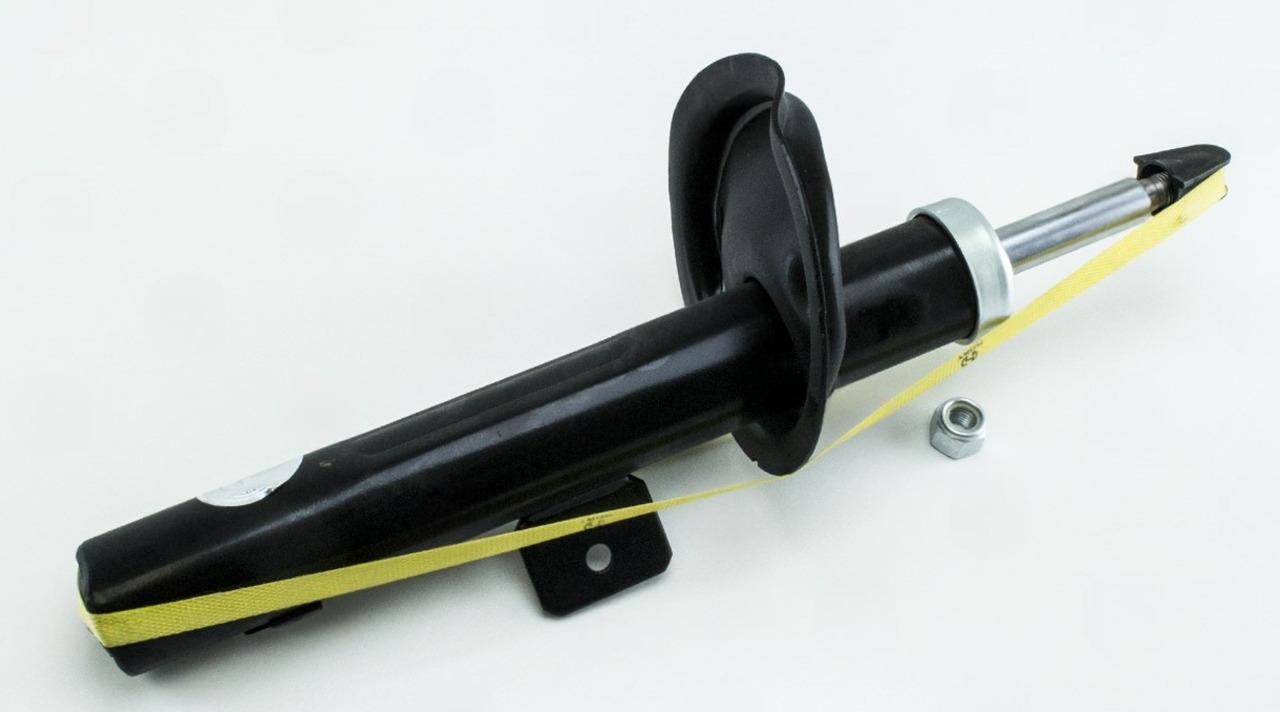 амортизатор пер. Citroen Berlingo-Peugeot Partner (02-08) левая L,  газ.  (HORT)