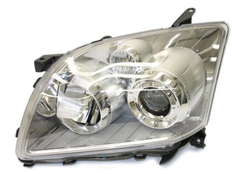 TO AVEN 03- лев. фара H7/H1, автом., черн. рамка 7/06-